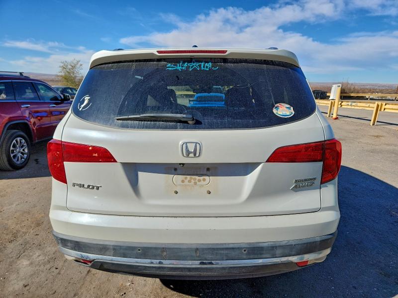 Photo 6 from auction – 2016 HONDA PILOT with VIN 5FNYF6H95GB005035