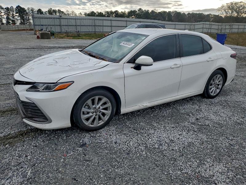 TOYOTA CAMRY LE 2022 with VIN 4T1C11AK2NU653036 - Photo from auction
