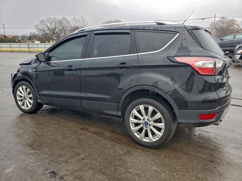 Photo 2 from auction – 2017 FORD ESCAPE TIT with VIN 1FMCU0JD6HUC92837
