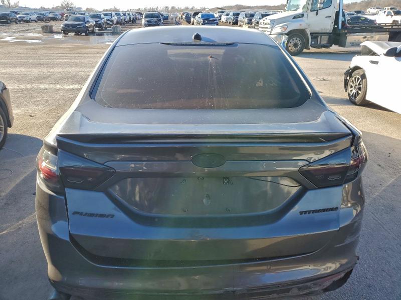 Photo 6 from auction – 2016 FORD FUSION TIT with VIN 3FA6P0K94GR325154