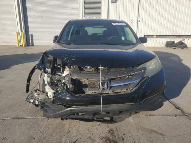Photo 5 from auction – 2014 HONDA CR-V LX with VIN 2HKRM3H32EH561919