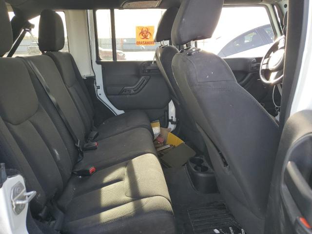 Photo 10 from auction – 2015 JEEP WRANGLER U with VIN 1C4BJWDG4FL570025