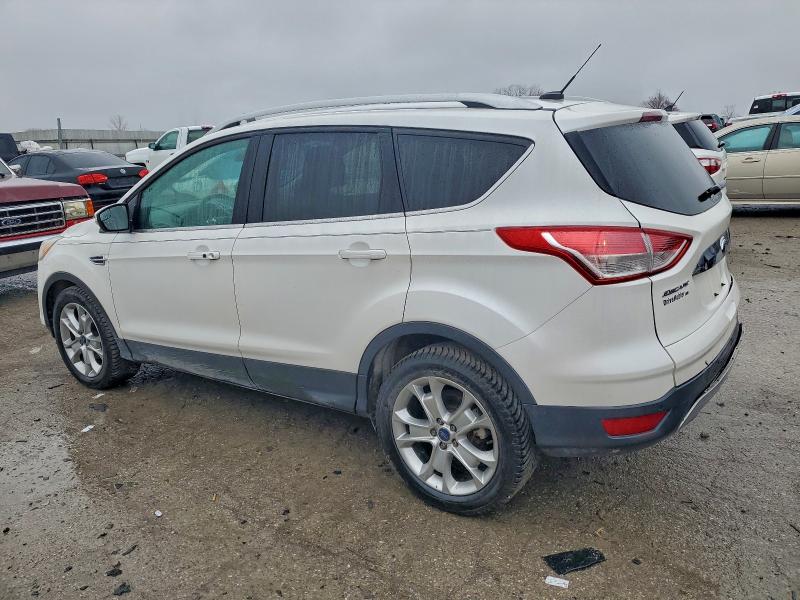 Photo 2 from auction – 2016 FORD ESCAPE TIT with VIN 1FMCU0JX2GUC24687