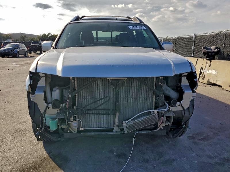 Photo 5 from auction – 2014 HONDA RIDGELINE with VIN 5FPYK1F60EB008419