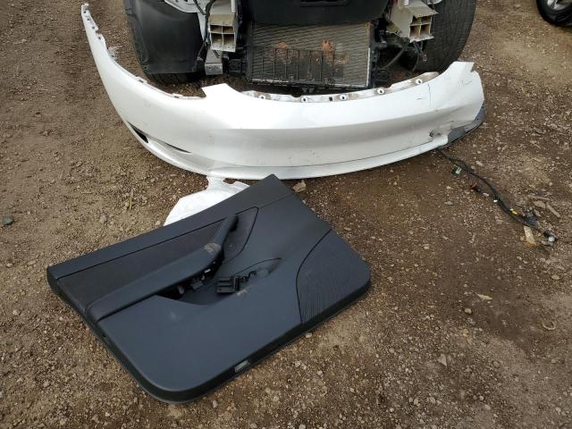 Photo 12 from auction – 2021 TESLA MODEL Y with VIN 5YJYGDEE4MF063457