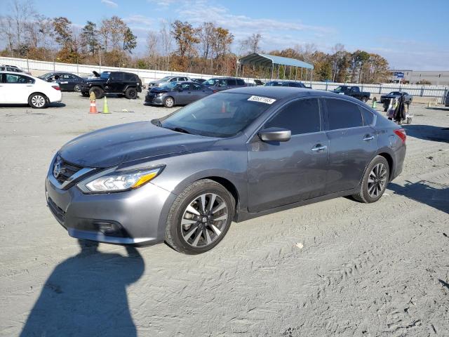 NISSAN ALTIMA 2.5 2018 with VIN 1N4AL3AP1JC261720 - Photo from auction