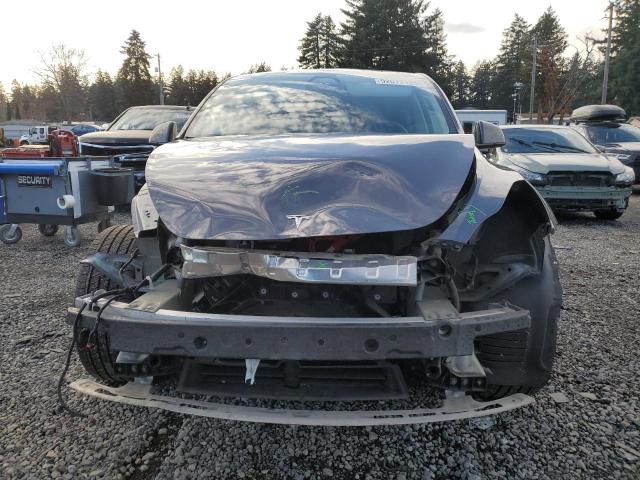 Photo 5 from auction – 2023 TESLA MODEL Y with VIN 7SAYGDEE3PF910038