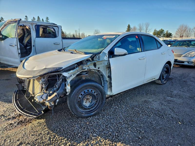 TOYOTA COROLLA L 2015 with VIN 2T1BURHE9FC235075 - Photo from auction