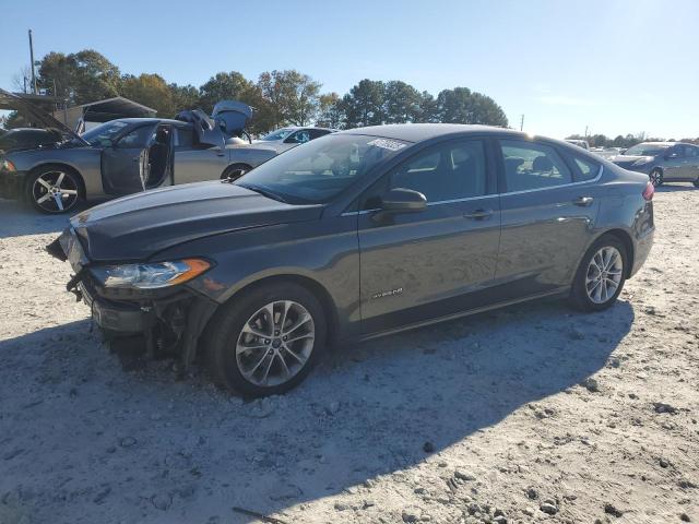 FORD FUSION SE 2019 with VIN 3FA6P0LU9KR210836 - Photo from auction