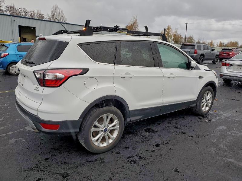 Photo 3 from auction – 2017 FORD ESCAPE SE with VIN 1FMCU0GD6HUE77297