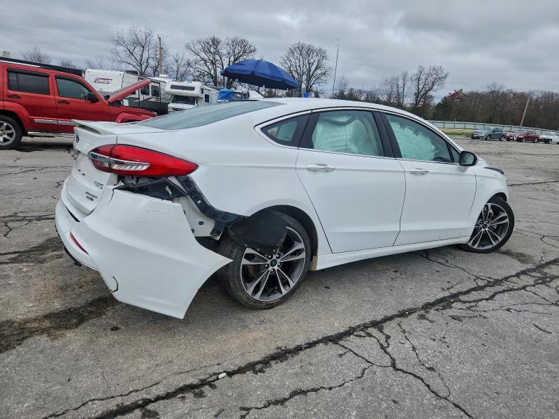 Photo 3 from auction – 2019 FORD FUSION TIT with VIN 3FA6P0D9XKR184869