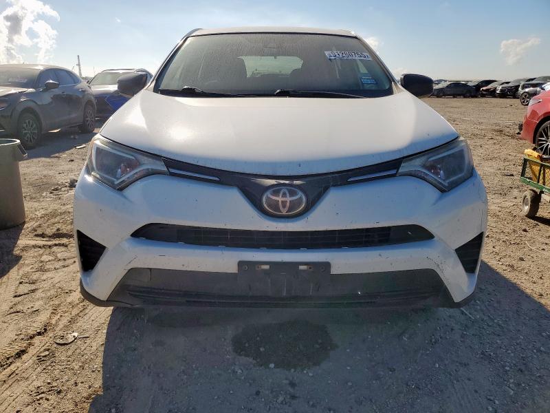 Photo 5 from auction – 2018 TOYOTA RAV4 LE with VIN JTMZFREV0JJ150863