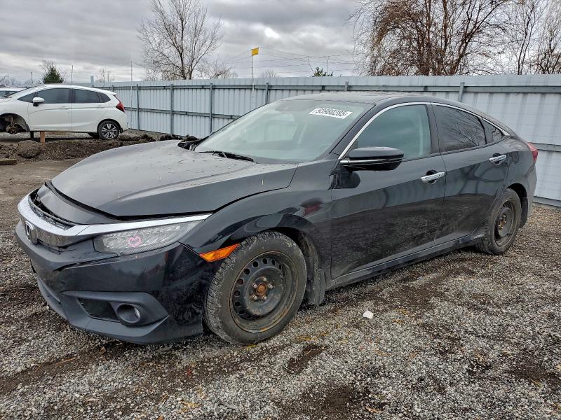 HONDA CIVIC 2017 with VIN 2HGFC1F92HH105600 - Photo from auction