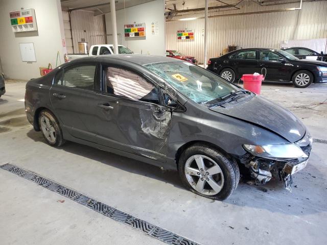 Photo 4 from auction – 2011 HONDA CIVIC LX-S with VIN 2HGFA1F64BH538063