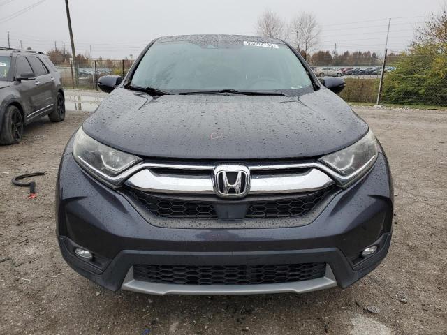 Photo 5 from auction – 2018 HONDA CR-V EXL with VIN 7FARW1H85JE056058