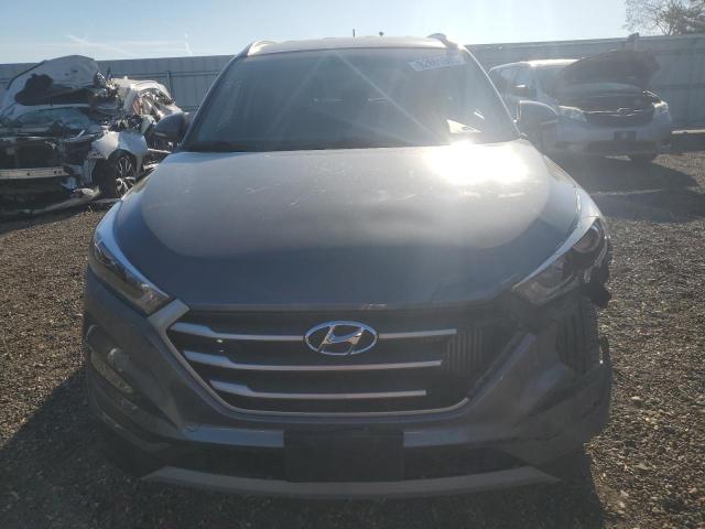 Photo 5 from auction – 2017 HYUNDAI TUCSON LIM with VIN KM8J3CA23HU537605