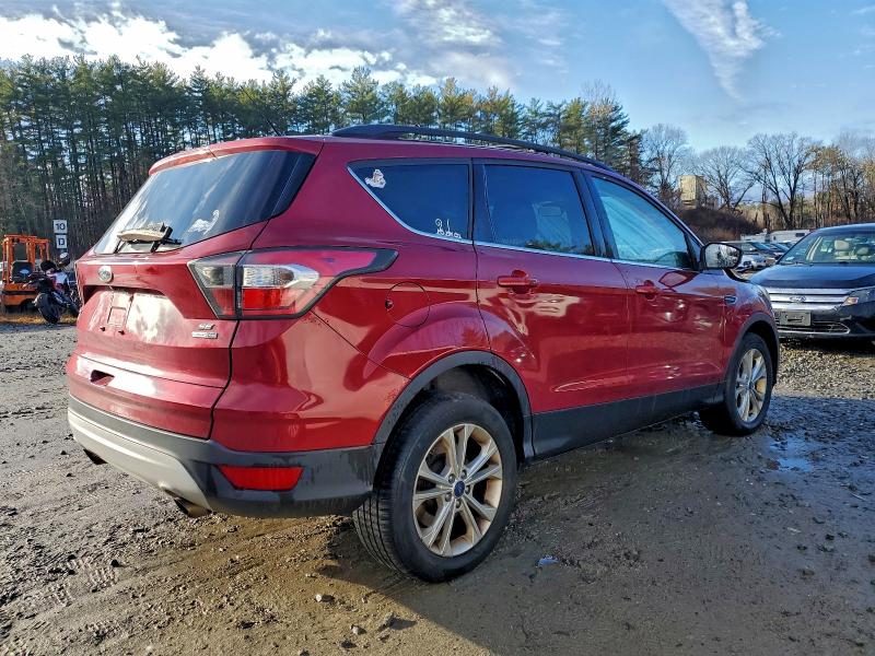 Photo 3 from auction – 2017 FORD ESCAPE SE with VIN 1FMCU9GD1HUA17579