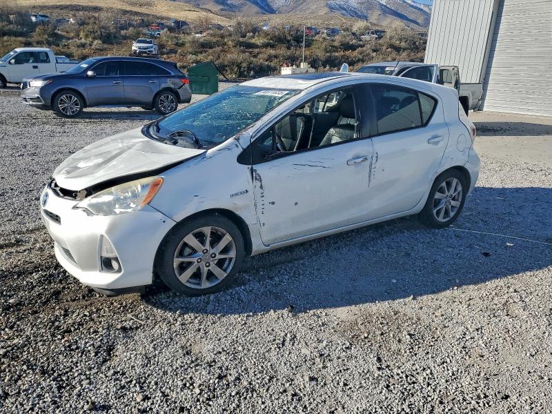 TOYOTA PRIUS C 2012 with VIN JTDKDTB33C1006945 - Photo from auction