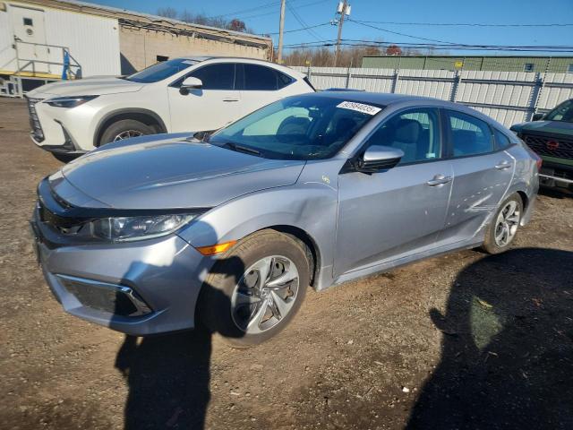 HONDA CIVIC LX 2019 with VIN 2HGFC2E63KH586607 - Photo from auction