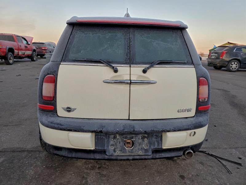 Photo 6 from auction – 2009 MINI COOPER with VIN WMWML335X9TN69335
