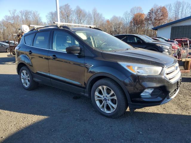 Photo 4 from auction – 2018 FORD ESCAPE SE with VIN 1FMCU0GDXJUA43485