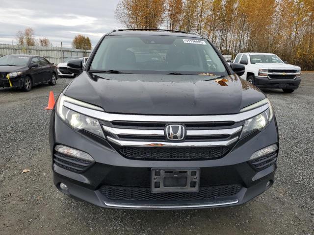 Photo 5 from auction – 2017 HONDA PILOT ELIT with VIN 5FNYF6H00HB079398