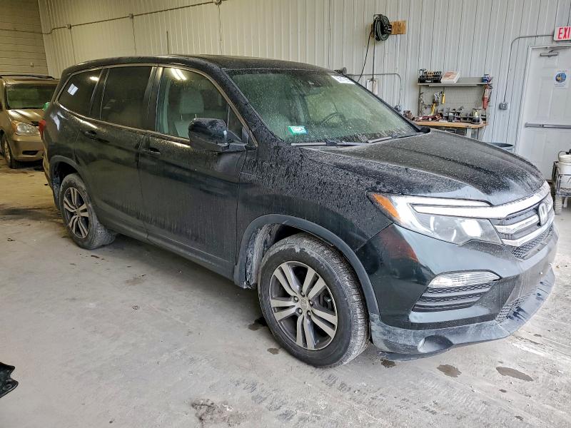 Photo 4 from auction – 2016 HONDA PILOT EXL with VIN 5FNYF6H66GB024392