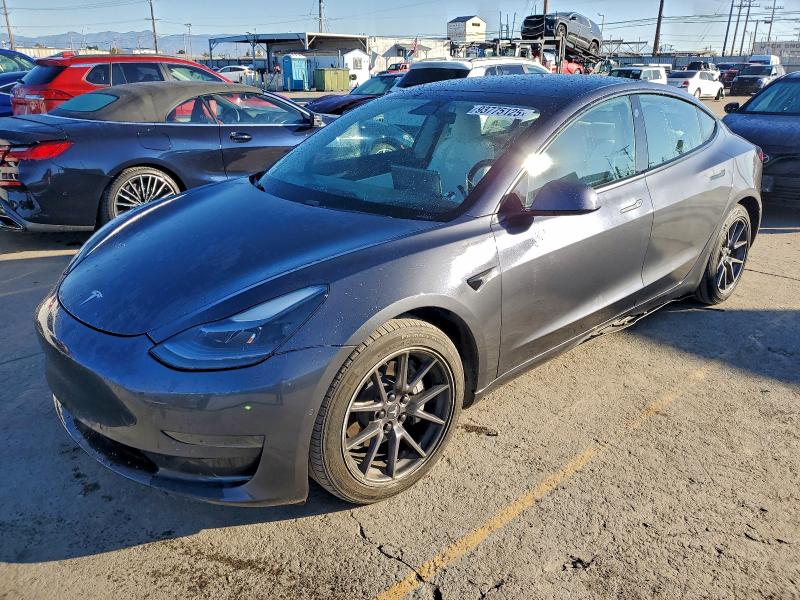 TESLA MODEL 3 2021 with VIN 5YJ3E1EA0MF875267 - Photo from auction