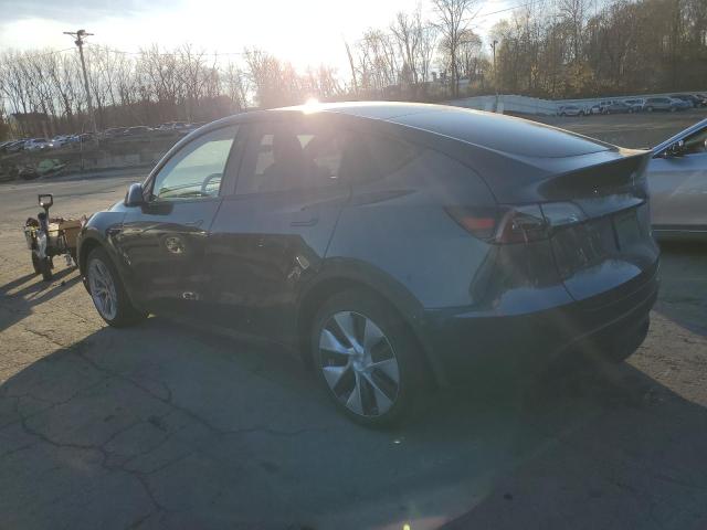 Photo 2 from auction – 2023 TESLA MODEL Y with VIN 7SAYGAEE6PF967994