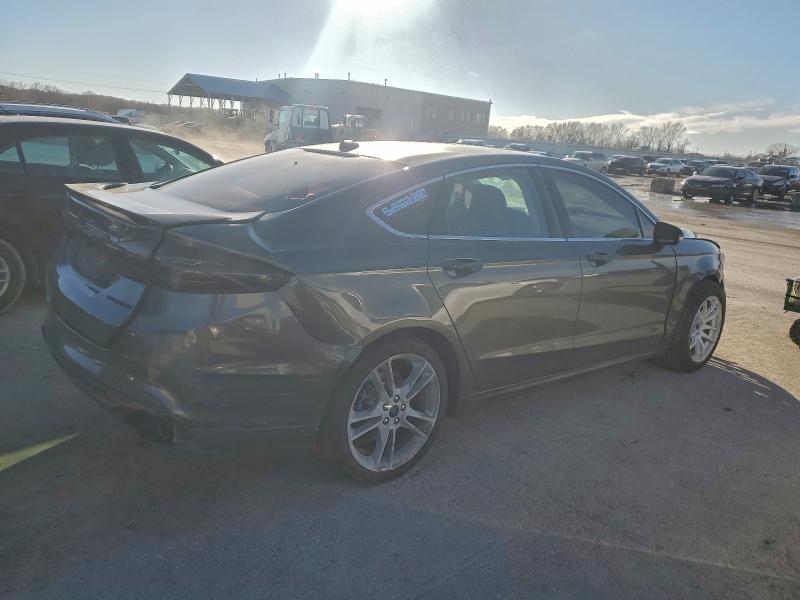 Photo 3 from auction – 2016 FORD FUSION TIT with VIN 3FA6P0K94GR325154