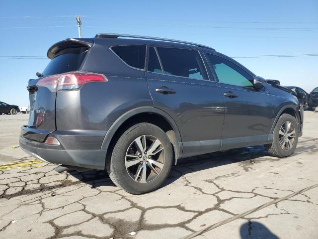 Photo 3 from auction – 2017 TOYOTA RAV4 XLE with VIN JTMWFREV5HJ128192