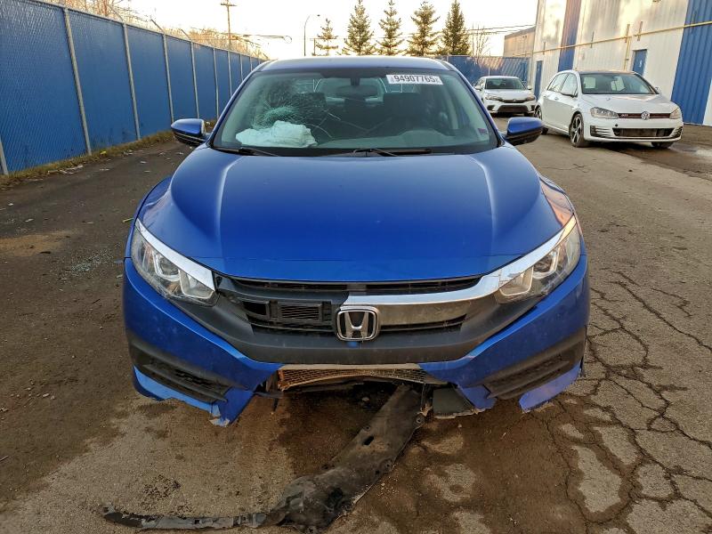 Photo 5 from auction – 2016 HONDA CIVIC LX with VIN 2HGFC2F58GH032881