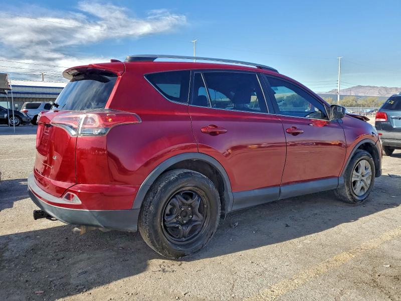 Photo 3 from auction – 2018 TOYOTA RAV4 LE with VIN 2T3ZFREV1JW514631