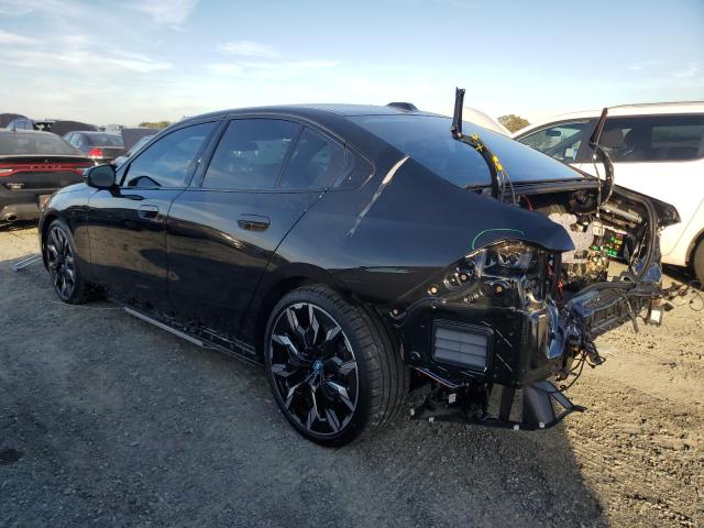 Photo 2 from auction – 2025 BMW 550 XE with VIN WBA13FK09SCU62258
