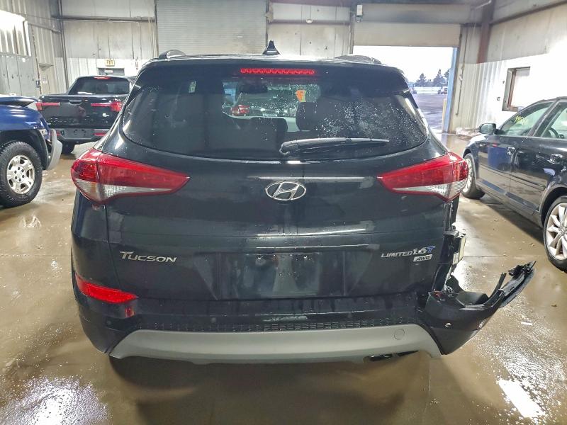 Photo 6 from auction – 2018 HYUNDAI TUCSON VAL with VIN KM8J3CA23JU784046