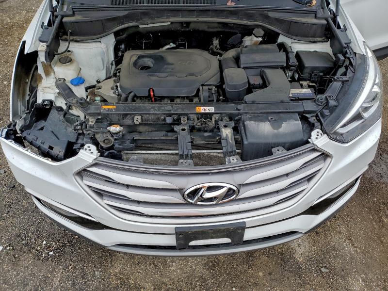 Photo 11 from auction – 2017 HYUNDAI SANTA FE S with VIN 5NMZU3LB2HH003214