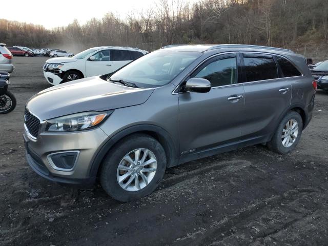 KIA SORENTO LX 2016 with VIN 5XYPGDA51GG130692 - Photo from auction