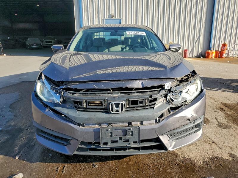 Photo 5 from auction – 2017 HONDA CIVIC LX with VIN 19XFC2F55HE219622