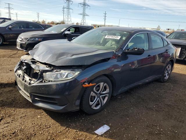 Photo 1 from auction – 2018 HONDA CIVIC LX with VIN 2HGFC2F50JH579554