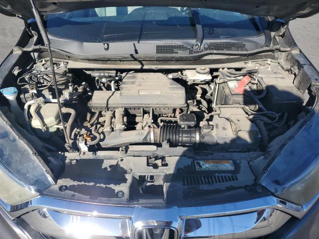 Photo 12 from auction – 2017 HONDA CR-V with VIN 7FARW1H54HE003206