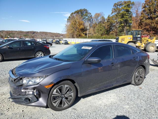 Photo 1 from auction – 2017 HONDA CIVIC with VIN 2HGFC1F34HH631495
