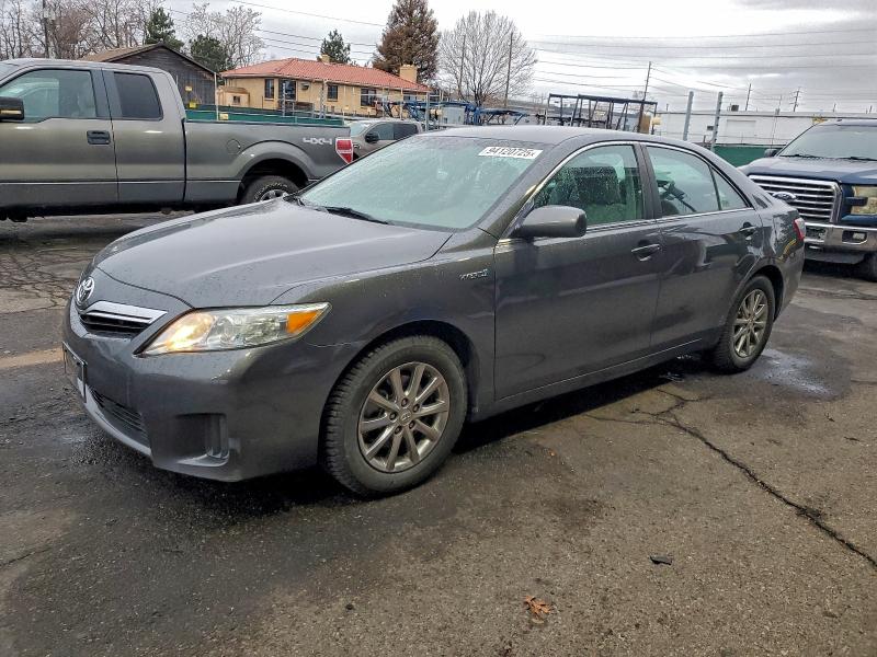 TOYOTA CAMRY HYBR 2011 with VIN 4T1BB3EK0BU137199 - Photo from auction