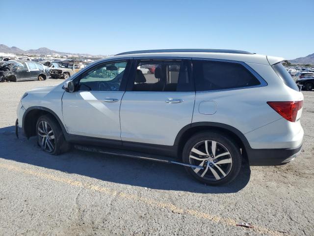 Photo 2 from auction – 2016 HONDA PILOT TOUR with VIN 5FNYF6H92GB093462