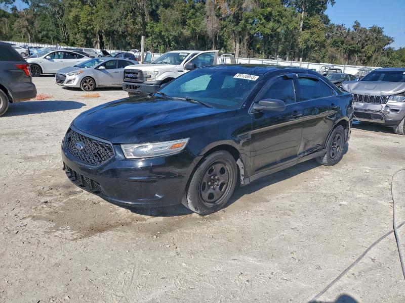FORD TAURUS POL 2014 with VIN 1FAHP2MK3EG138268 - Photo from auction