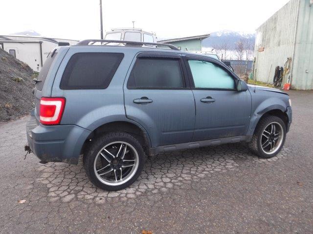 Photo 4 from auction – 2010 FORD ESCAPE LIM with VIN 1FMCU9EG7AKB77769