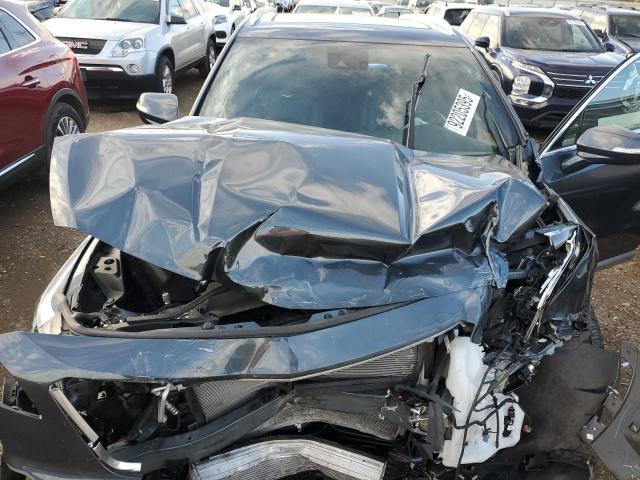 Photo 11 from auction – 2021 CADILLAC XT4 PREMIU with VIN 1GYFZCR49MF013186