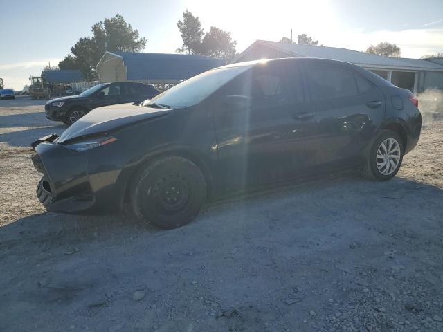 TOYOTA COROLLA L 2017 with VIN 5YFBURHE7HP587848 - Photo from auction