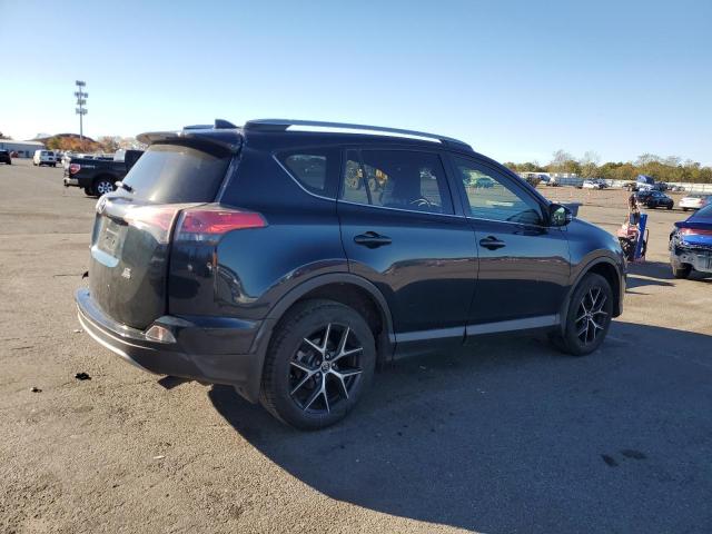 Photo 3 from auction – 2018 TOYOTA RAV4 SE with VIN JTMJFREV8JD236983