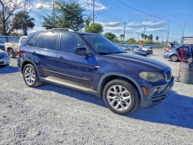 Фото 4 с аукциона – 2009 BMW X5 с VIN 5UXFE43519L275915