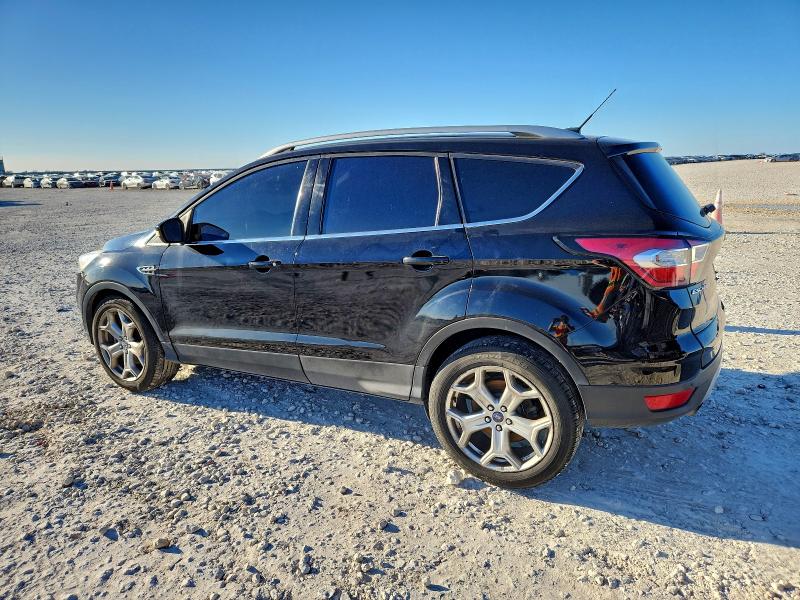 Photo 2 from auction – 2017 FORD ESCAPE TIT with VIN 1FMCU0J90HUE93905